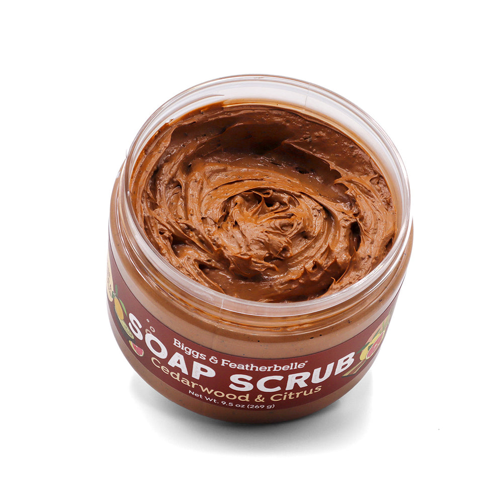 Opened jar of Cedarwood & Citrus Soap Scrub on a white background