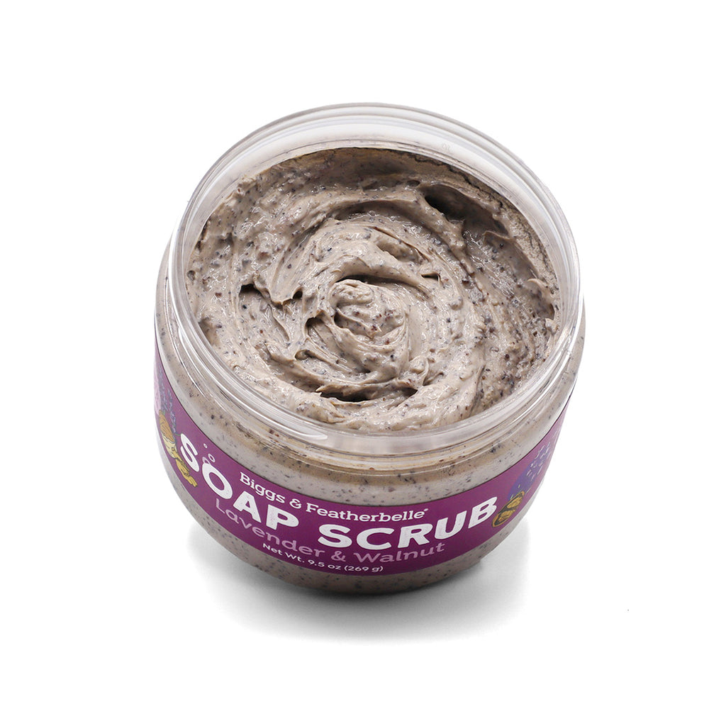 Open jar of Lavender & Walnut Soap Scrub with a purple label on a white background