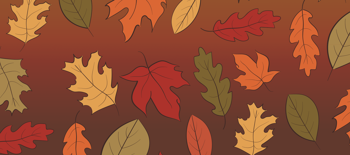 Colorful fall leaves falling on a dark background.